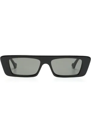 Gucci Lentes de sol con armazón rectangular y logo estampado