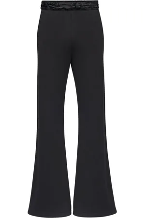 Maison Margiela Pantalones acampanados con volantes en la pretina