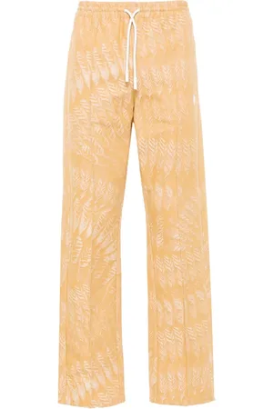 MARCELO BURLON Pantalones AOP Feather