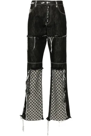 MISBHV Jeans acampanados con diseño patchwork