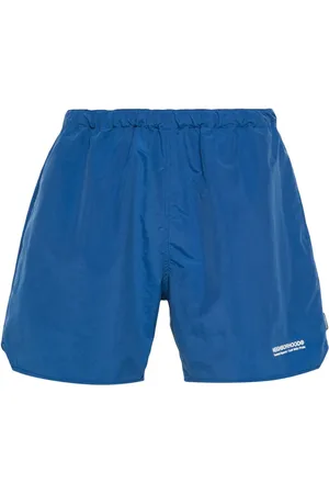 NEIGHBORHOOD Shorts de playa con logo estampado