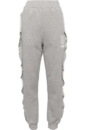 UNDERCOVER Pantalones con detalles deshilachados
