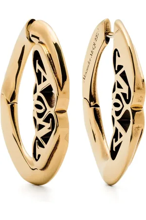 Alexander McQueen Aretes con motivo Seal
