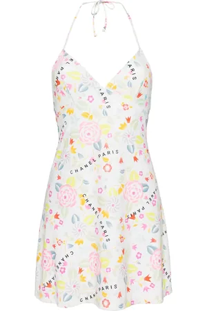 CHANEL Vestido corto con estampado Camellia