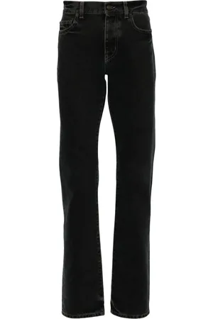 Saint Laurent Jeans con botones del logo