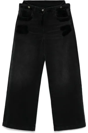 The Attico Jeans con capas en la cintura