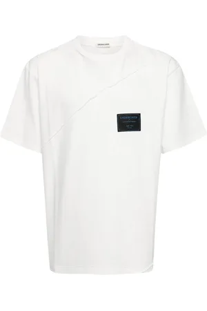 UNDERCOVER Playera con aplique del logo