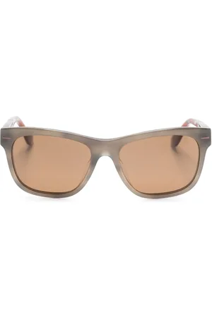 Brunello Cucinelli Lentes de sol con logo grabado
