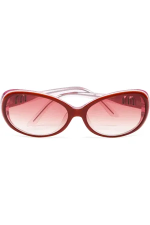 Miu Miu Lentes de sol con armazón oval