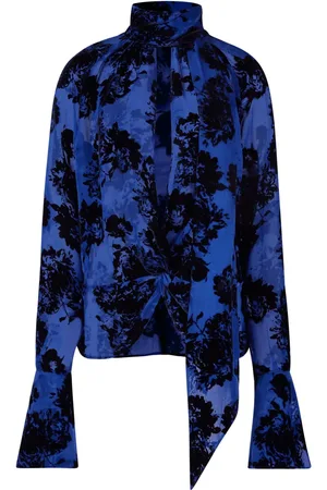 Nina Ricci Blusa con estampado floral y moño en el cuello
