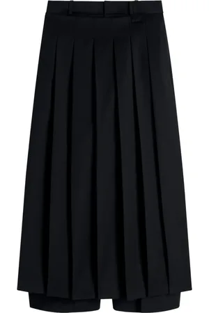 Simone Rocha Pantalones con capa estilo delantal