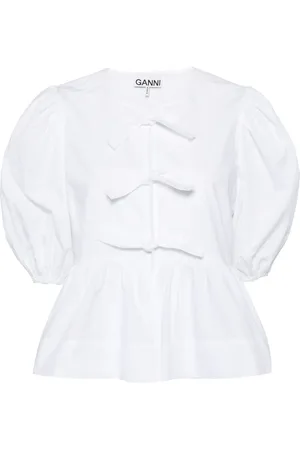 Ganni Blusa con peplum