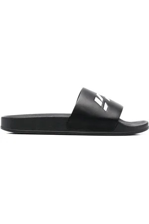 Vetements Flip flops con logo estampado