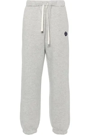 JOSHUA SANDERS Pants con bordado Smiley