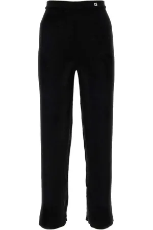 Gucci Pantalones con aplique del logo
