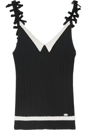 CHANEL Top con placa del logo 2006