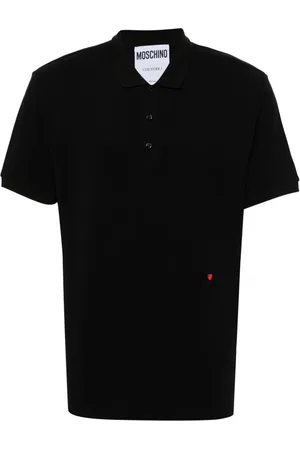 Moschino Playera tipo polo con corazón bordado