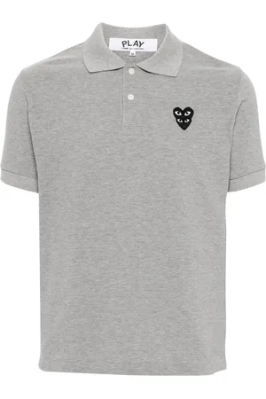 Comme des Garçons Playera tipo polo con parche de corazón