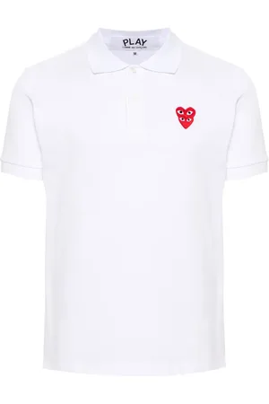 Comme des Garçons Playera tipo polo con parche de corazón