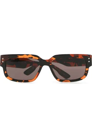 Gucci Lentes de sol con armazón cuadrada