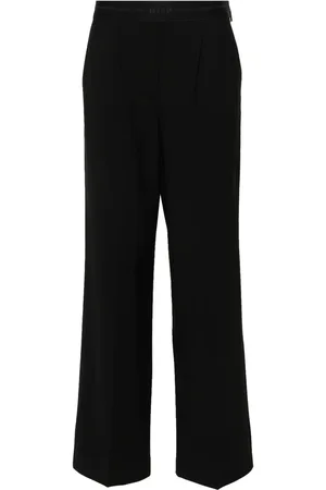 Msgm Pantalones de vestir con logo en la pretina