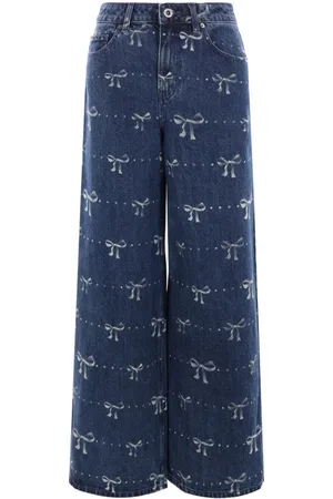 Self-Portrait Jeans con moño estampado