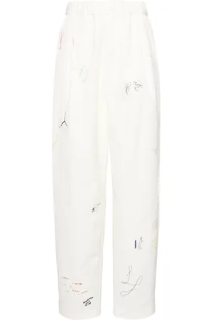 UNDERCOVER Pantalones con estampado estilo boceto