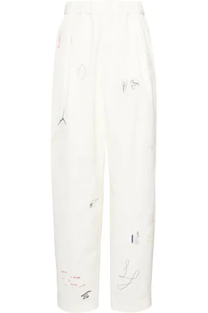 UNDERCOVER Pantalones con estampado estilo boceto