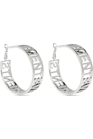 Vetements Aretes con logo y aberturas