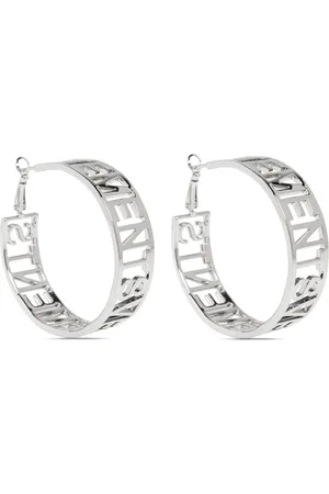 Vetements Aretes con logo y aberturas
