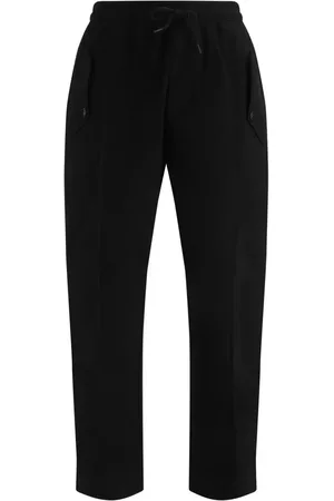 Moschino Joggers con código de barra