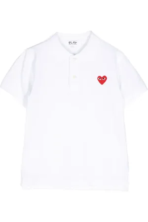 Comme des Garçons Playera tipo polo bordada