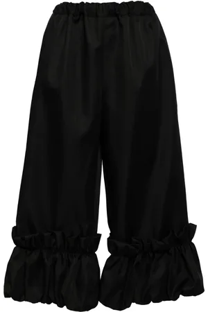 Comme des Garçons Pantalones con volantes