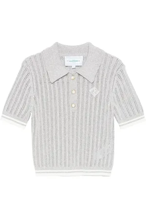 Casablanca Playera tipo polo con placa del logo