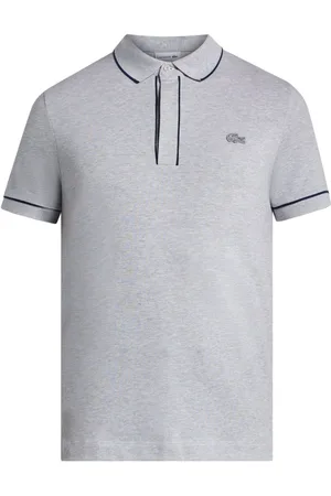 Lacoste Playera tipo polo con parche del logo
