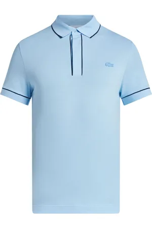 Lacoste Playera tipo polo con parche del logo