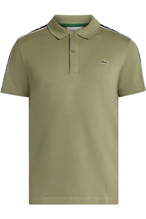 Lacoste Playera tipo polo con parche del logo