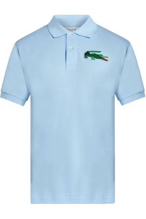 Lacoste Playera tipo polo con parche del logo
