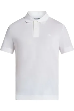 Lacoste Playera tipo polo con parche del logo