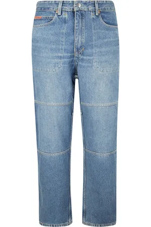 MARTINE ROSE Jeans reversible con estampado militar