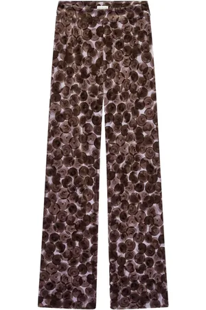 DRIES VAN NOTEN Pantalones con estampado abstracto