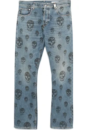 Alexander McQueen Jeans slim con calaveras estampadas