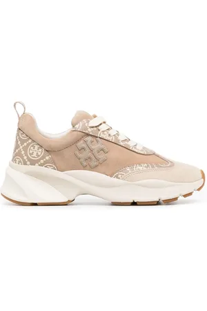 Tory Burch Tenis bajos con monograma estampado