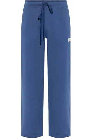 VERSACE Pants con placa del logo