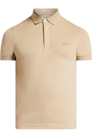 Lacoste Playera tipo polo con parche del logo