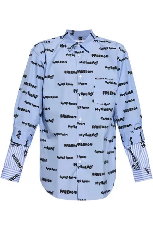 Comme des Garçons Camisa con eslogan estampado