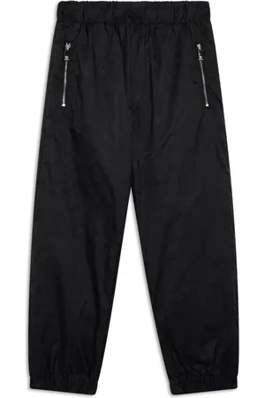 VERSACE Pantalones con bordado floral