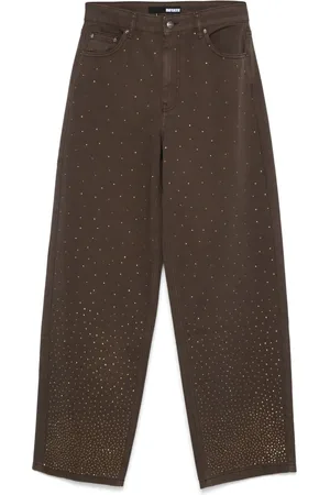 ROTATE Jeans anchos con detalles de strass