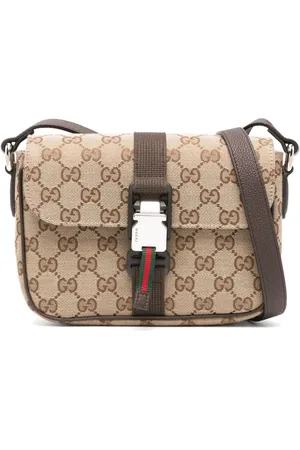 Gucci Mochila tipo mensajero GG mini
