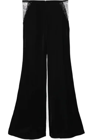 ROTATE Pantalones acampanados con tiro medio